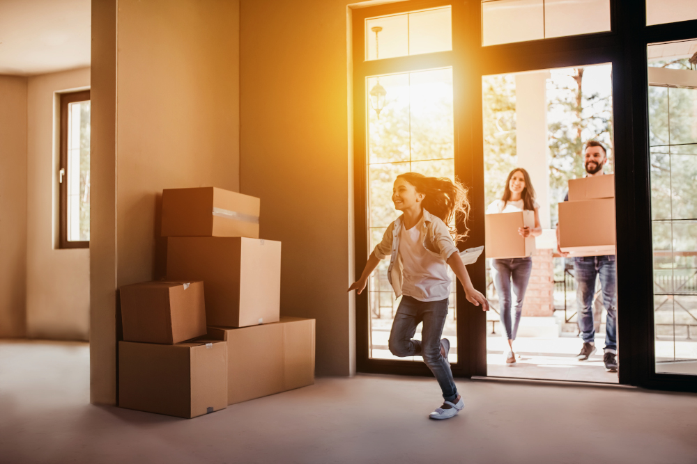 Young family moving into their new home