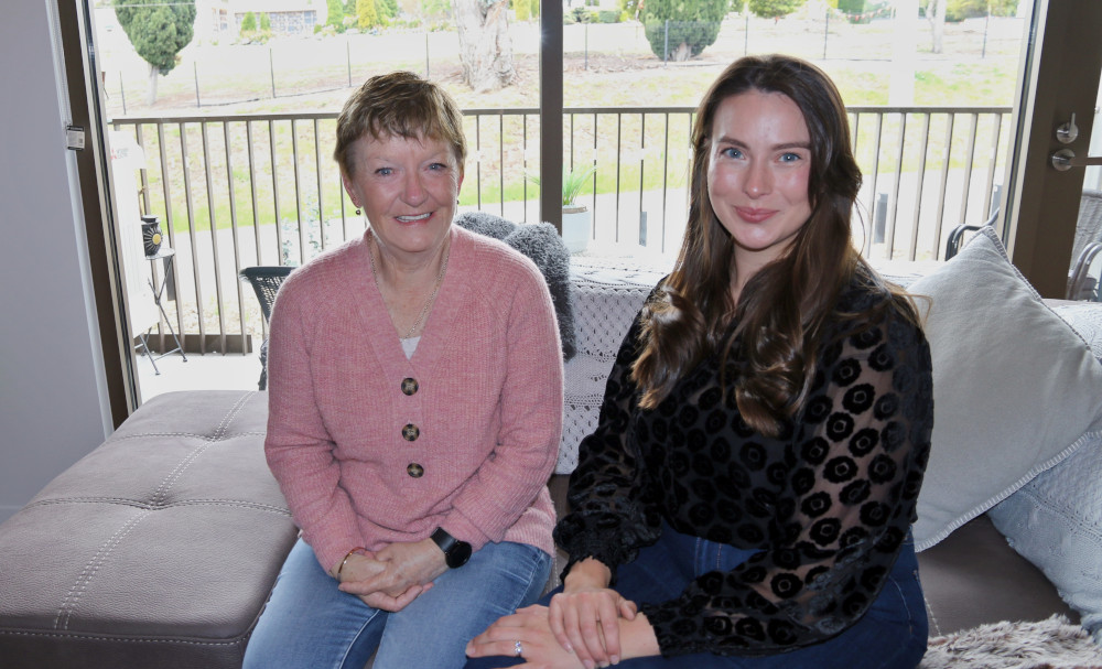 Queens Walk tenant Julie and Housing Choices Tasmania tenancy officer Rebecca Zirk